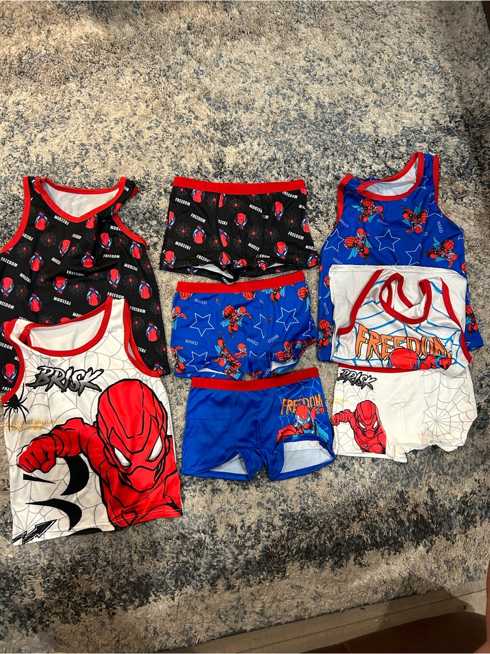 SHEIN Kids Spider Superhero Pajama Tank & Shorts Set - Red, Blue, White, Black.